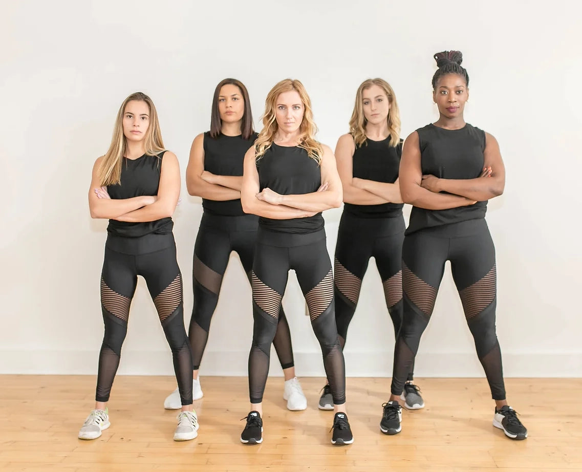 a group of 5 strong athletic women looking confident and ready to take on anything